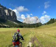 Mountain Biker with panorama Sella Dolomi